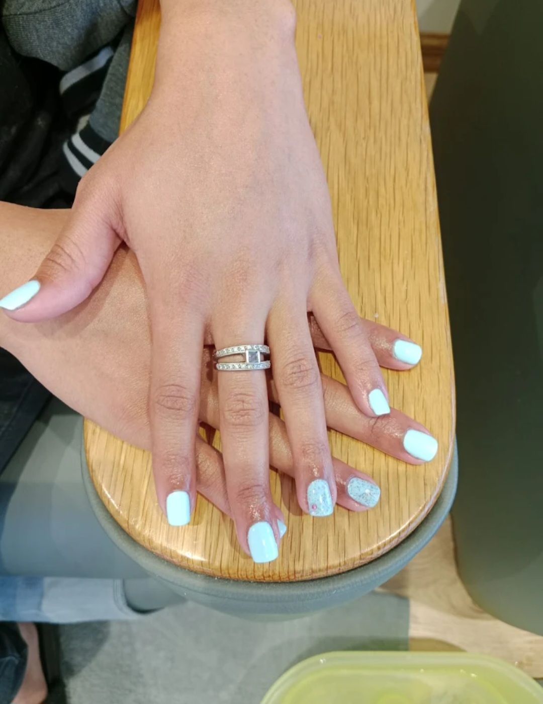 Pastel mint gel manicure with glitter